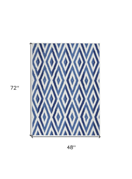 4' X 6' Ivory And Blue Geometric Area Rug