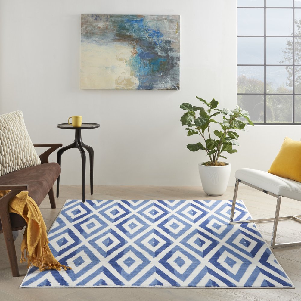 5' X 7' Ivory And Blue Geometric Area Rug