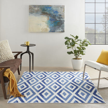5' X 7' Ivory And Blue Geometric Area Rug