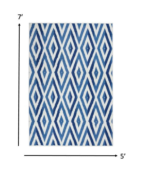 6' X 9' Blue And Ivory Geometric Dhurrie Area Rug