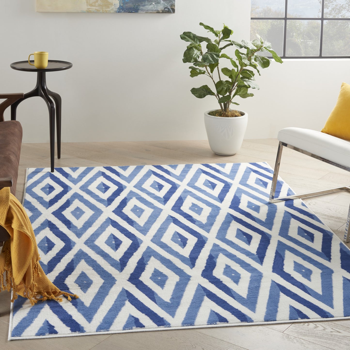 5' X 7' Ivory And Blue Geometric Area Rug