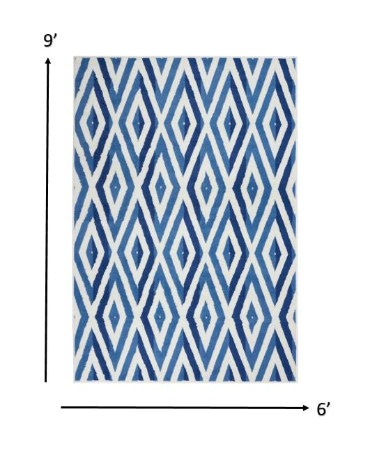 6' X 9' Blue And Ivory Geometric Dhurrie Area Rug