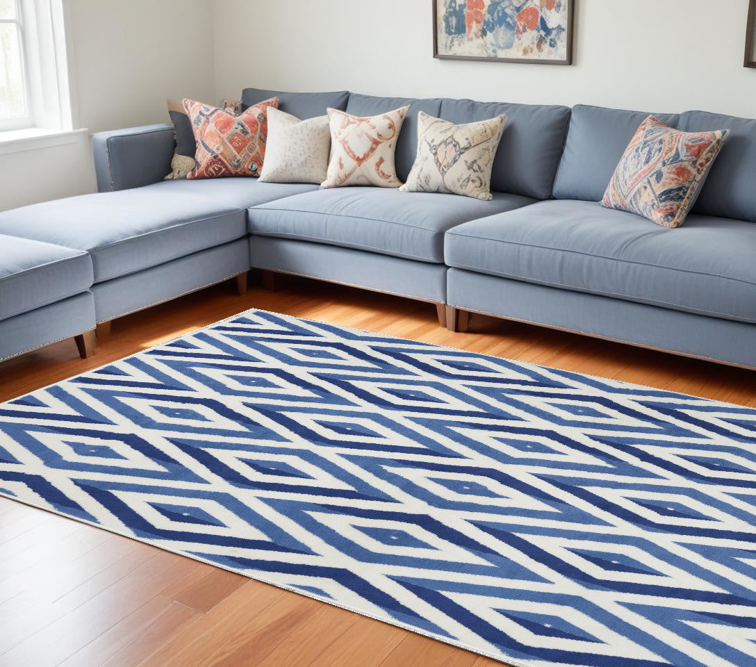 6' X 9' Blue And Ivory Geometric Dhurrie Area Rug