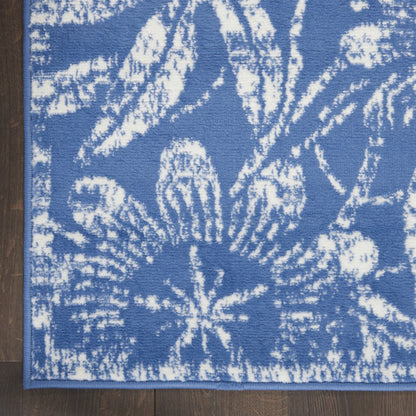 6' X 9' Blue And Ivory Floral Distressed Area Rug