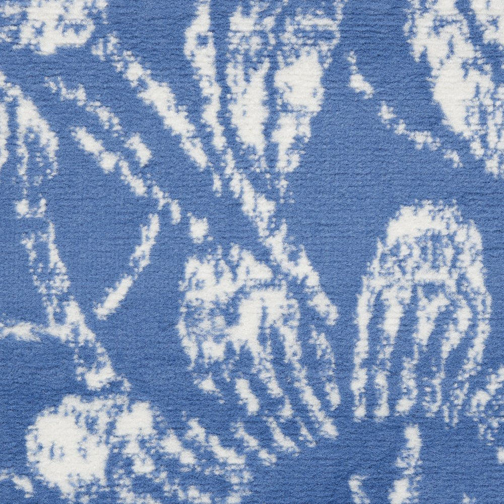 6' X 9' Blue And Ivory Floral Distressed Area Rug