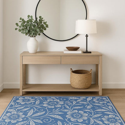 6' X 9' Blue And Ivory Floral Distressed Area Rug