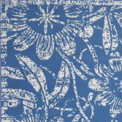5' X 7' Blue And Ivory Floral Vines Distressed Area Rug