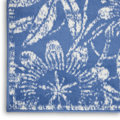 6' X 9' Blue And Ivory Floral Distressed Area Rug