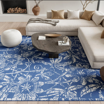 6' X 9' Blue And Ivory Floral Distressed Area Rug