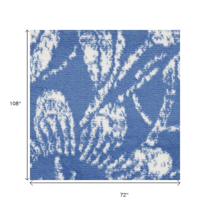 6' X 9' Blue And Ivory Floral Distressed Area Rug