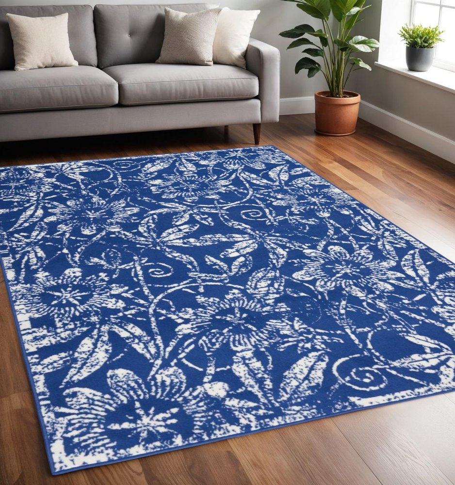 4' X 6' Navy Blue And Ivory Floral Distressed Area Rug