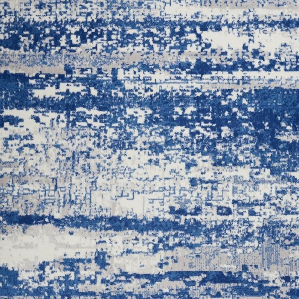 5' X 7' Ivory And Blue Ombre Distressed Area Rug