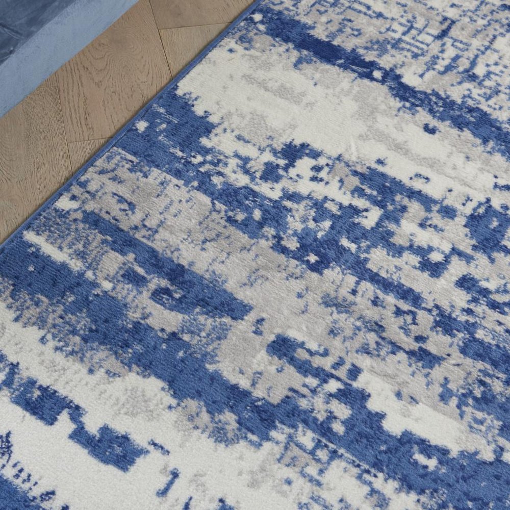 4' X 6' Ivory And Blue Ombre Distressed Area Rug