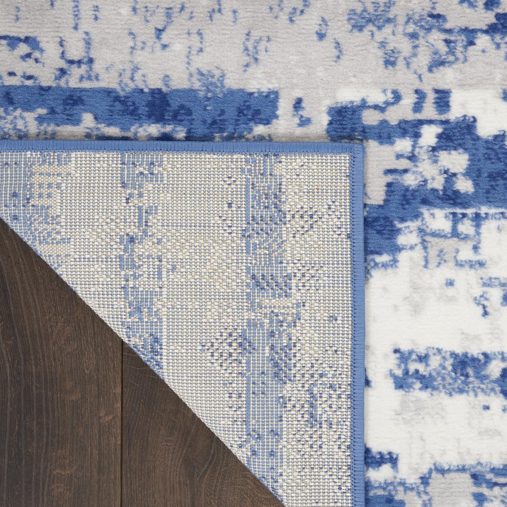4' X 6' Ivory And Blue Ombre Distressed Area Rug