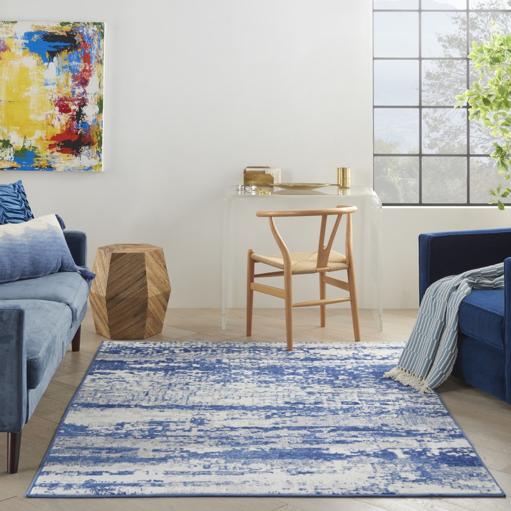 5' X 7' Ivory And Blue Ombre Distressed Area Rug