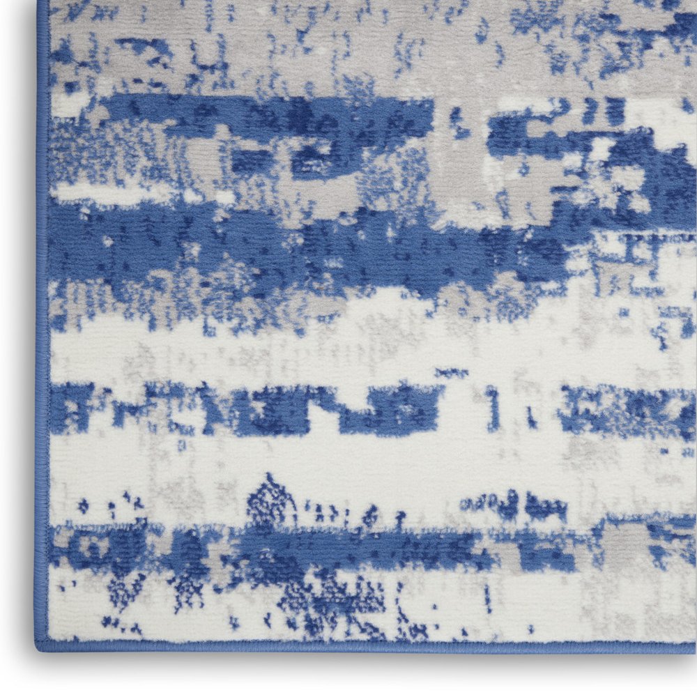 5' X 7' Ivory And Blue Ombre Distressed Area Rug