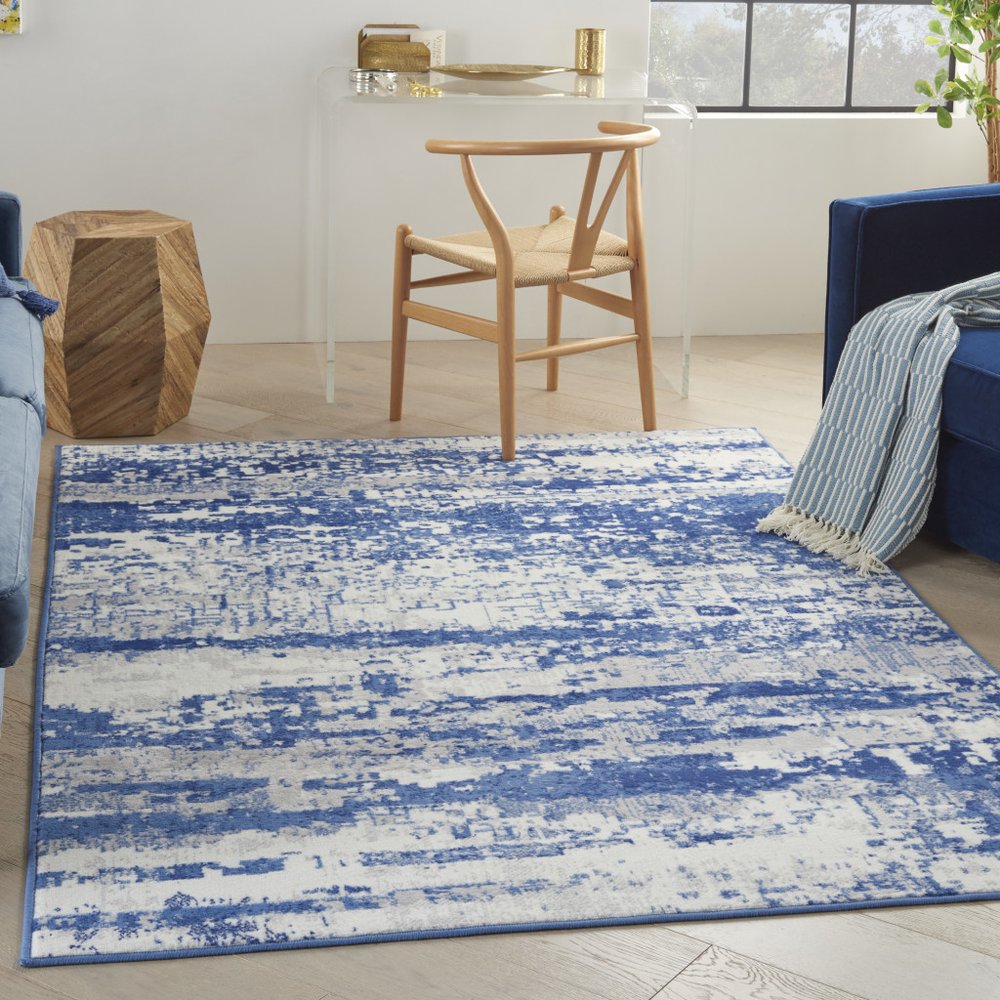 5' X 7' Ivory And Blue Ombre Distressed Area Rug