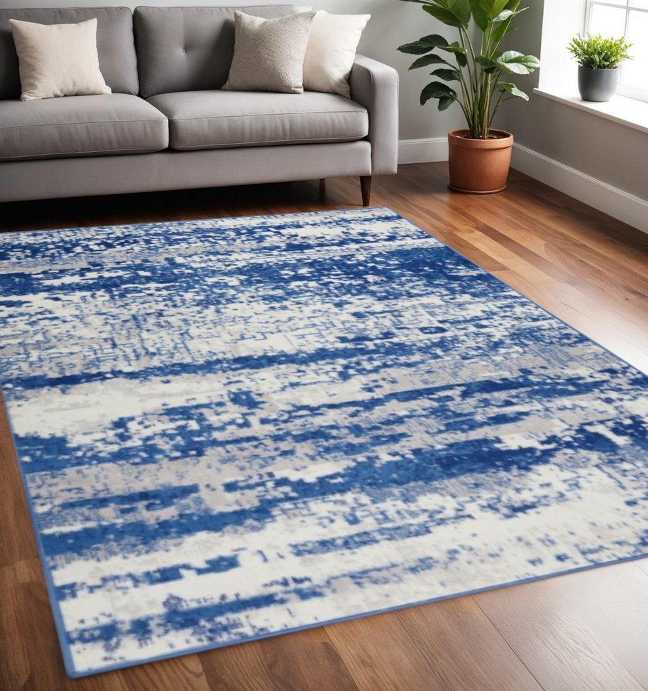 4' X 6' Ivory And Blue Ombre Distressed Area Rug