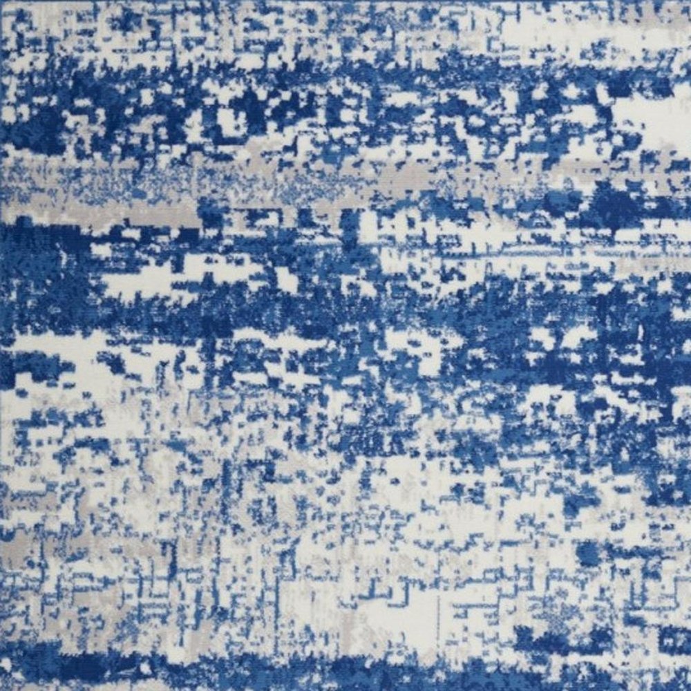 5' X 7' Ivory And Blue Ombre Distressed Area Rug