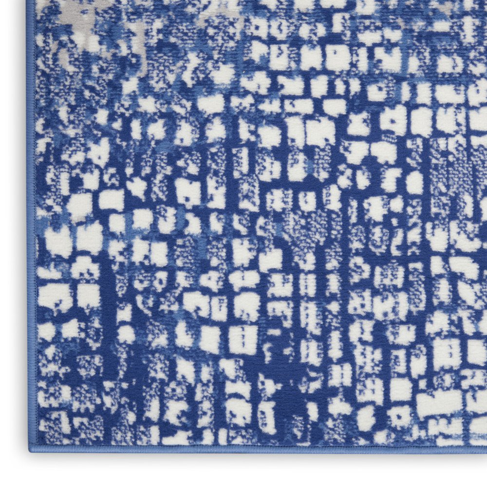 5' X 7' Ivory And Blue Geometric Area Rug