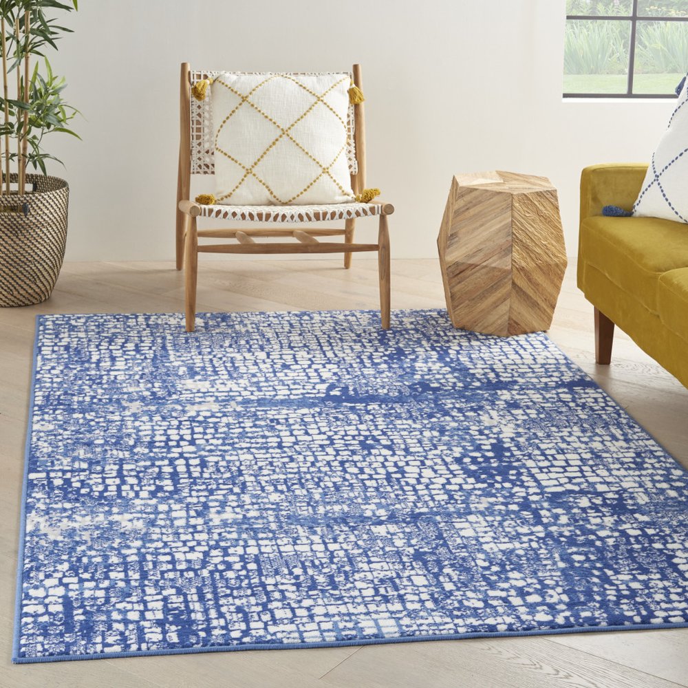 5' X 7' Ivory And Blue Geometric Area Rug