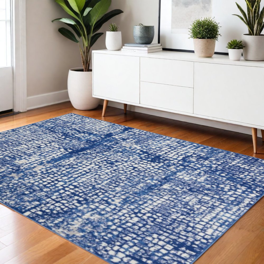 5' X 7' Ivory And Blue Geometric Area Rug