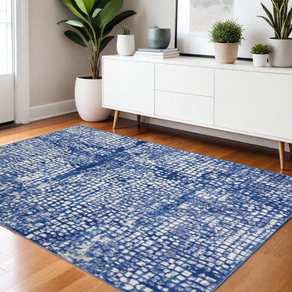 5' X 7' Ivory And Blue Geometric Area Rug