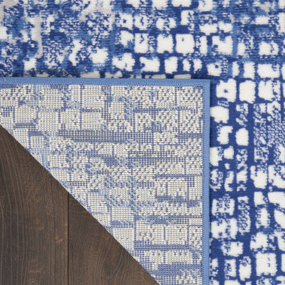 5' X 7' Ivory And Blue Geometric Area Rug