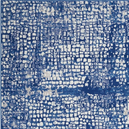 4' X 6' Ivory And Blue Geometric Area Rug