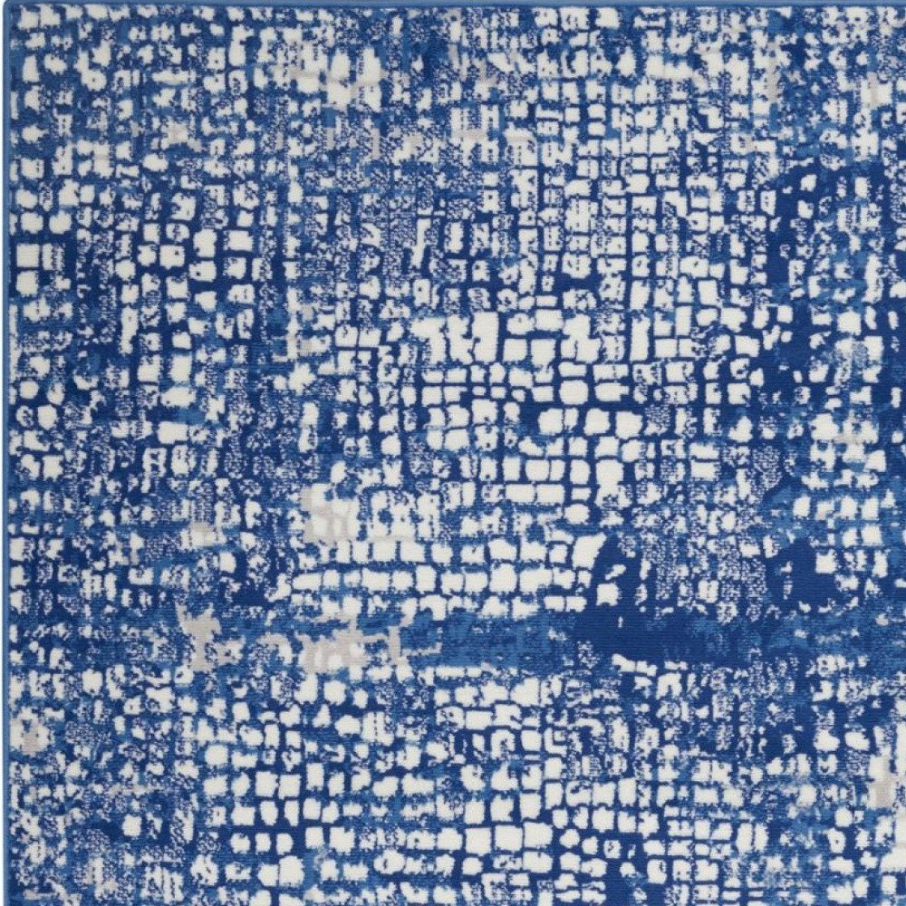 5' X 7' Ivory And Blue Geometric Area Rug