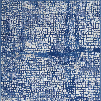 5' X 7' Ivory And Blue Geometric Area Rug