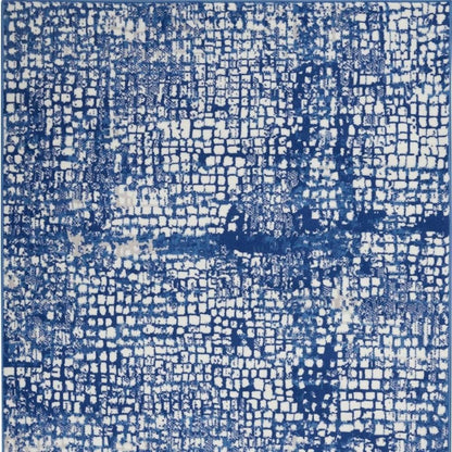 4' X 6' Ivory And Blue Geometric Area Rug