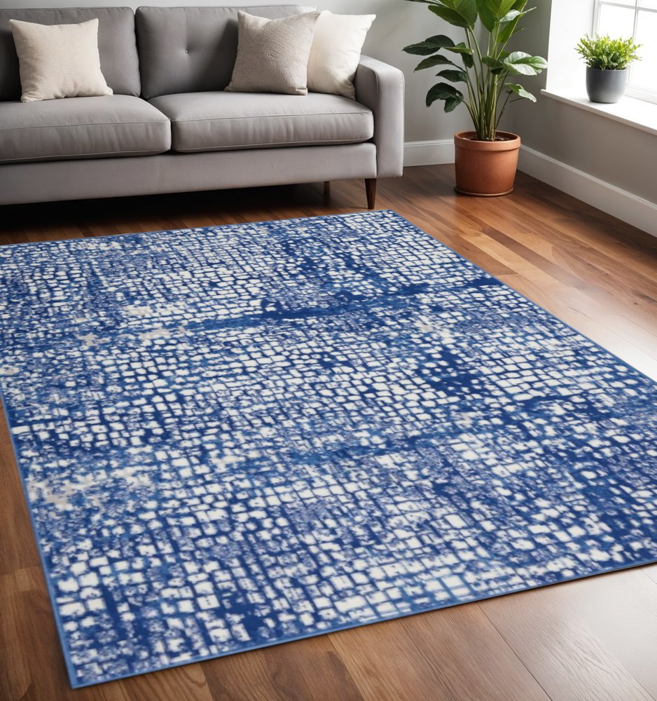 5' X 7' Ivory And Blue Geometric Area Rug