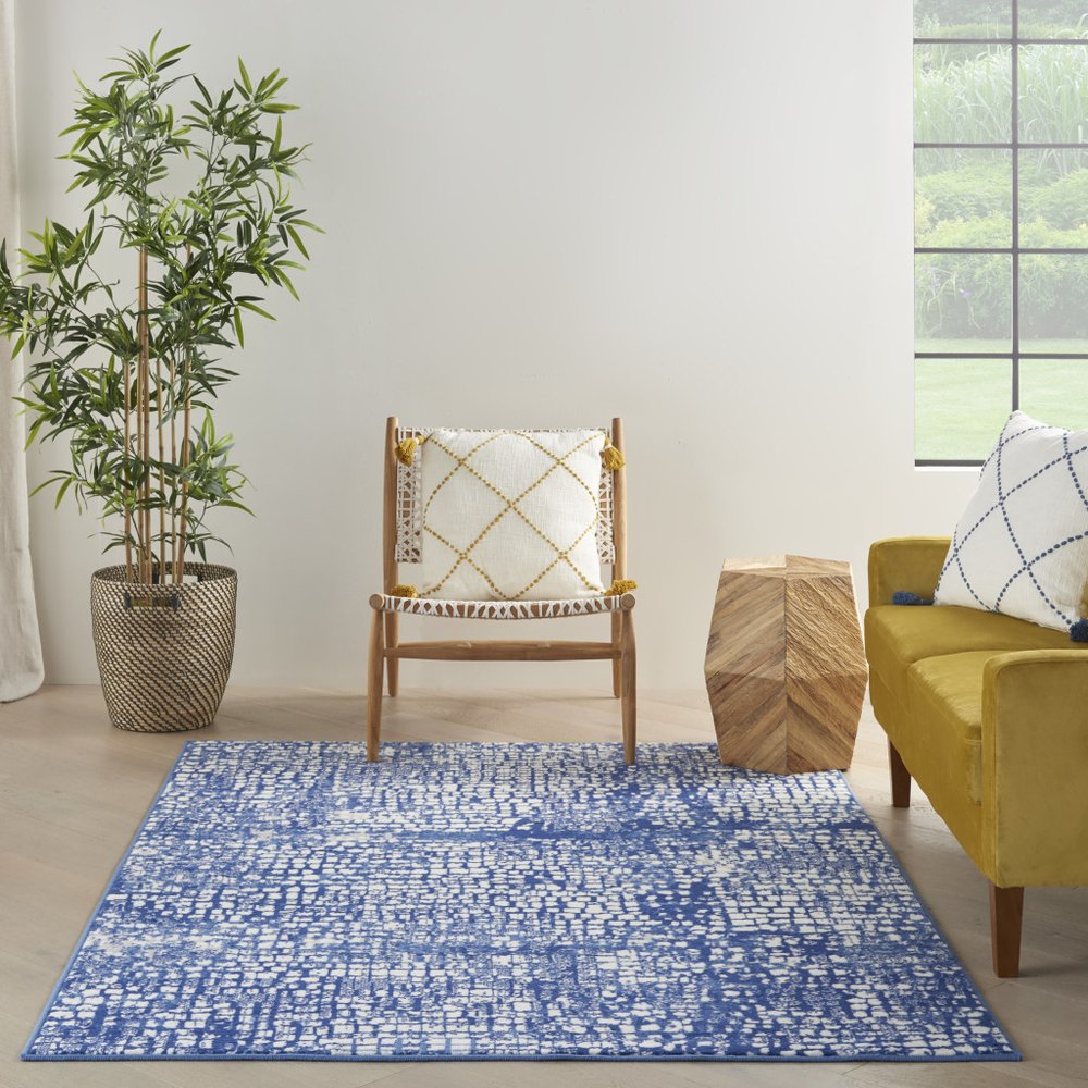 5' X 7' Ivory And Blue Geometric Area Rug