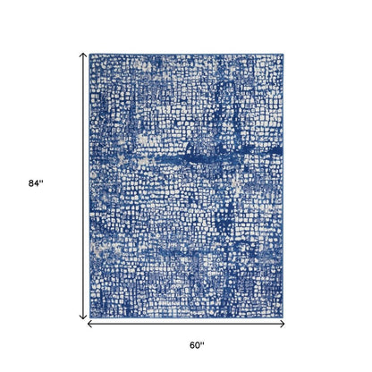 5' X 7' Ivory And Blue Geometric Area Rug