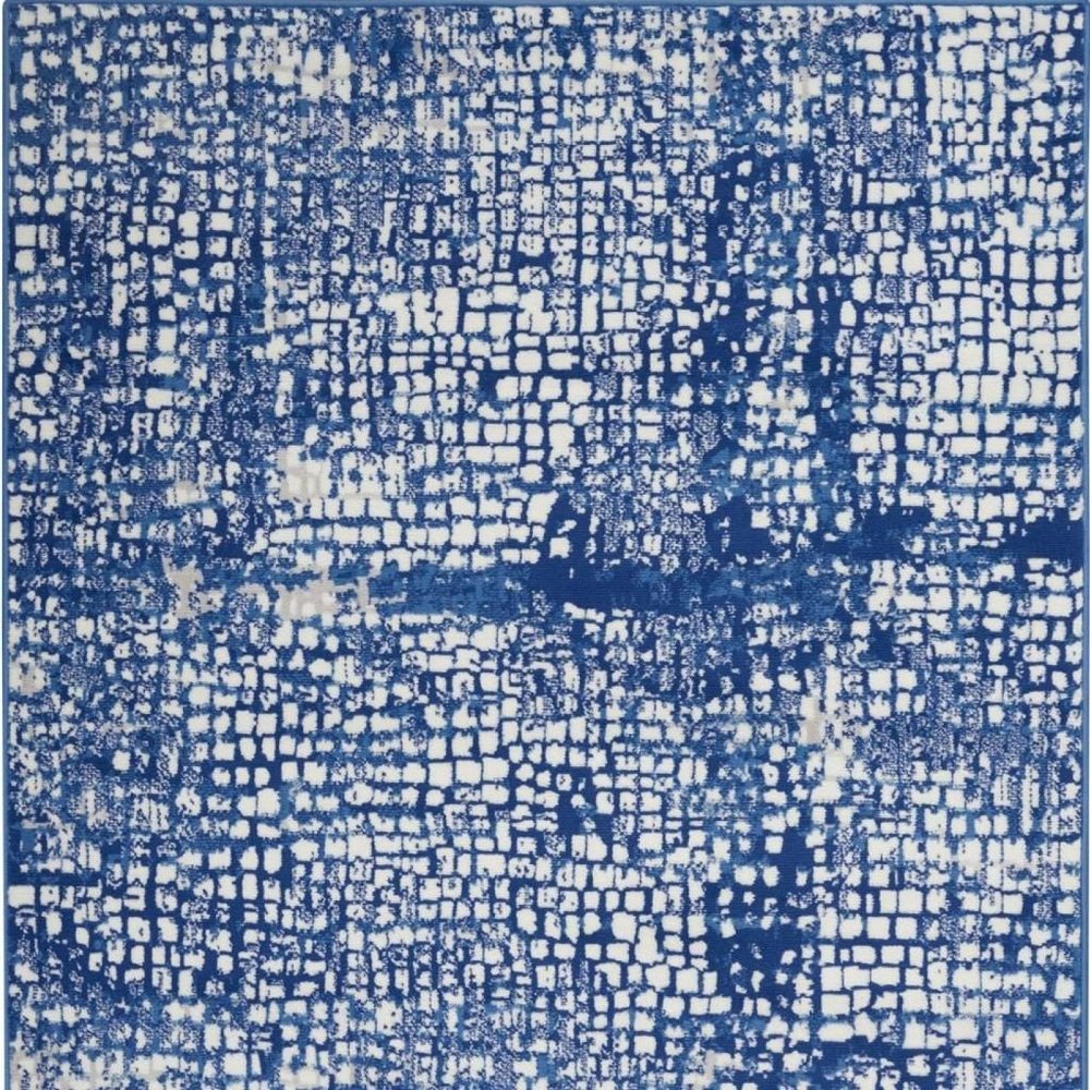 5' X 7' Ivory And Blue Geometric Area Rug