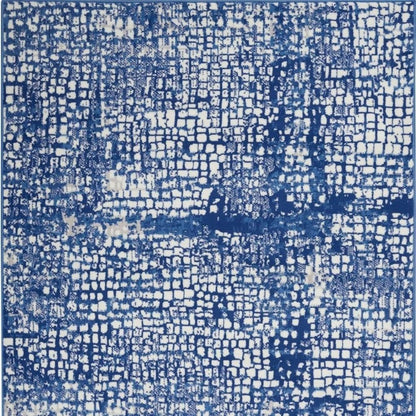 5' X 7' Ivory And Blue Geometric Area Rug