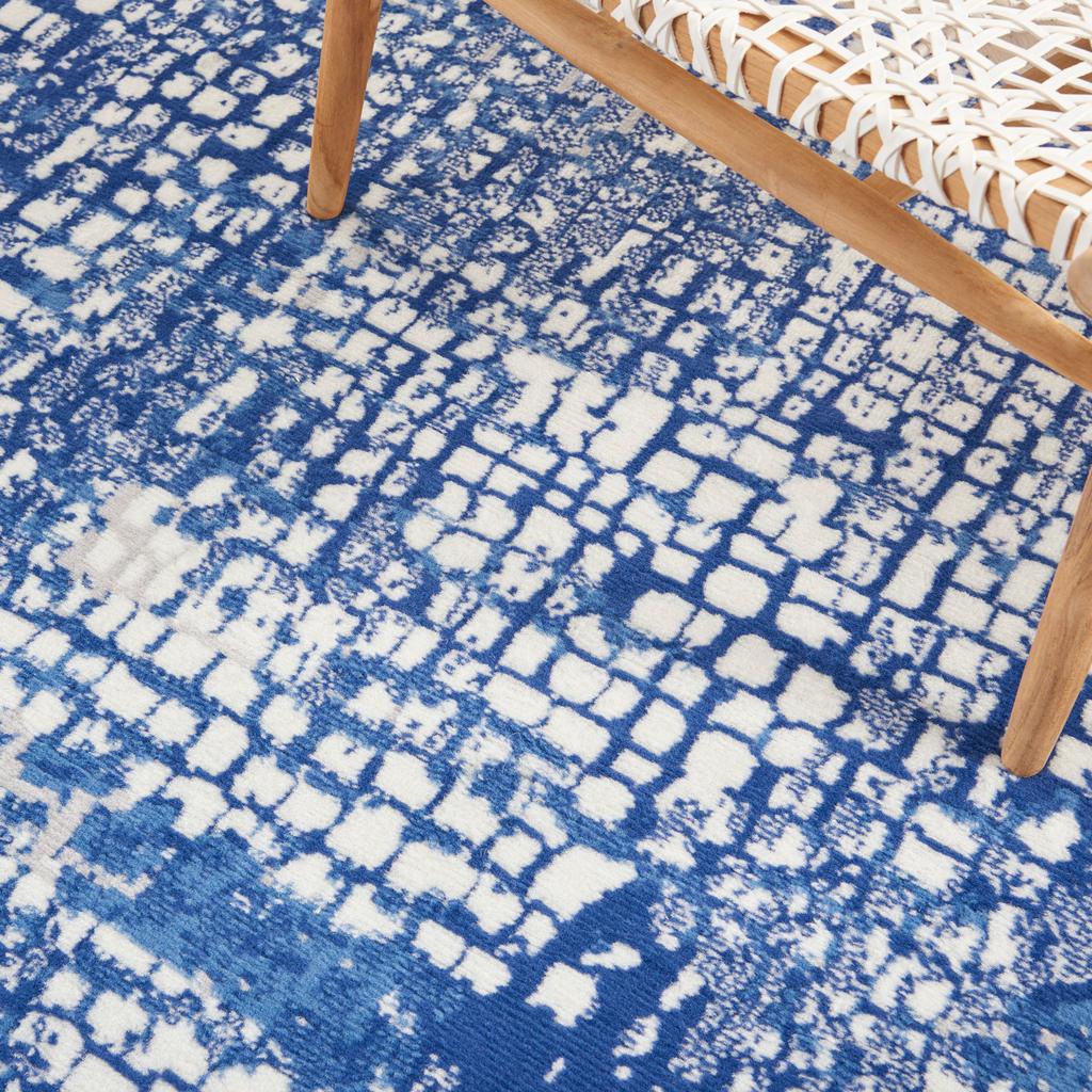 4' X 6' Blue And Ivory Abstract Dhurrie Area Rug