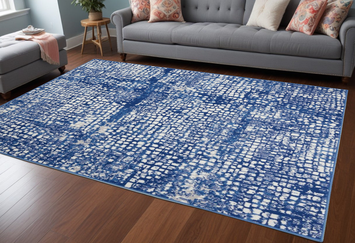 4' X 6' Blue And Ivory Abstract Dhurrie Area Rug