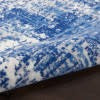 4' X 6' Blue And Ivory Abstract Dhurrie Area Rug