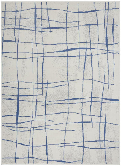 6' X 9' Ivory And Blue Geometric Distressed Area Rug