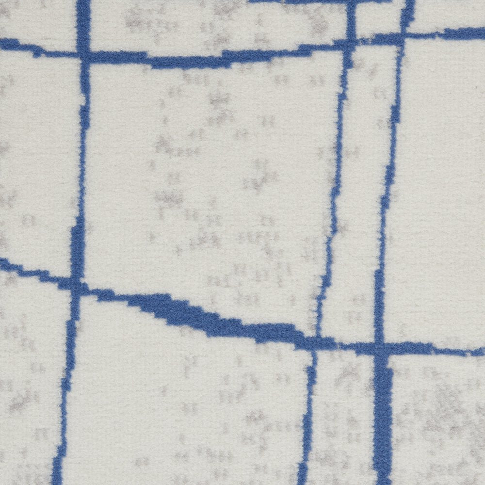 6' X 9' Ivory And Blue Geometric Distressed Area Rug