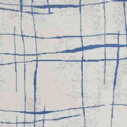 6' X 9' Ivory And Blue Geometric Distressed Area Rug