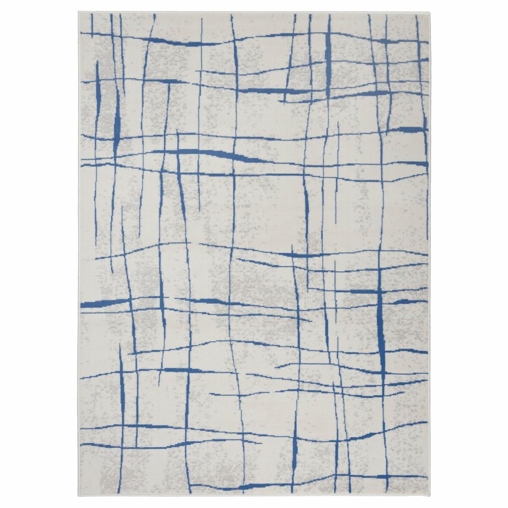 6' X 9' Ivory And Blue Geometric Distressed Area Rug
