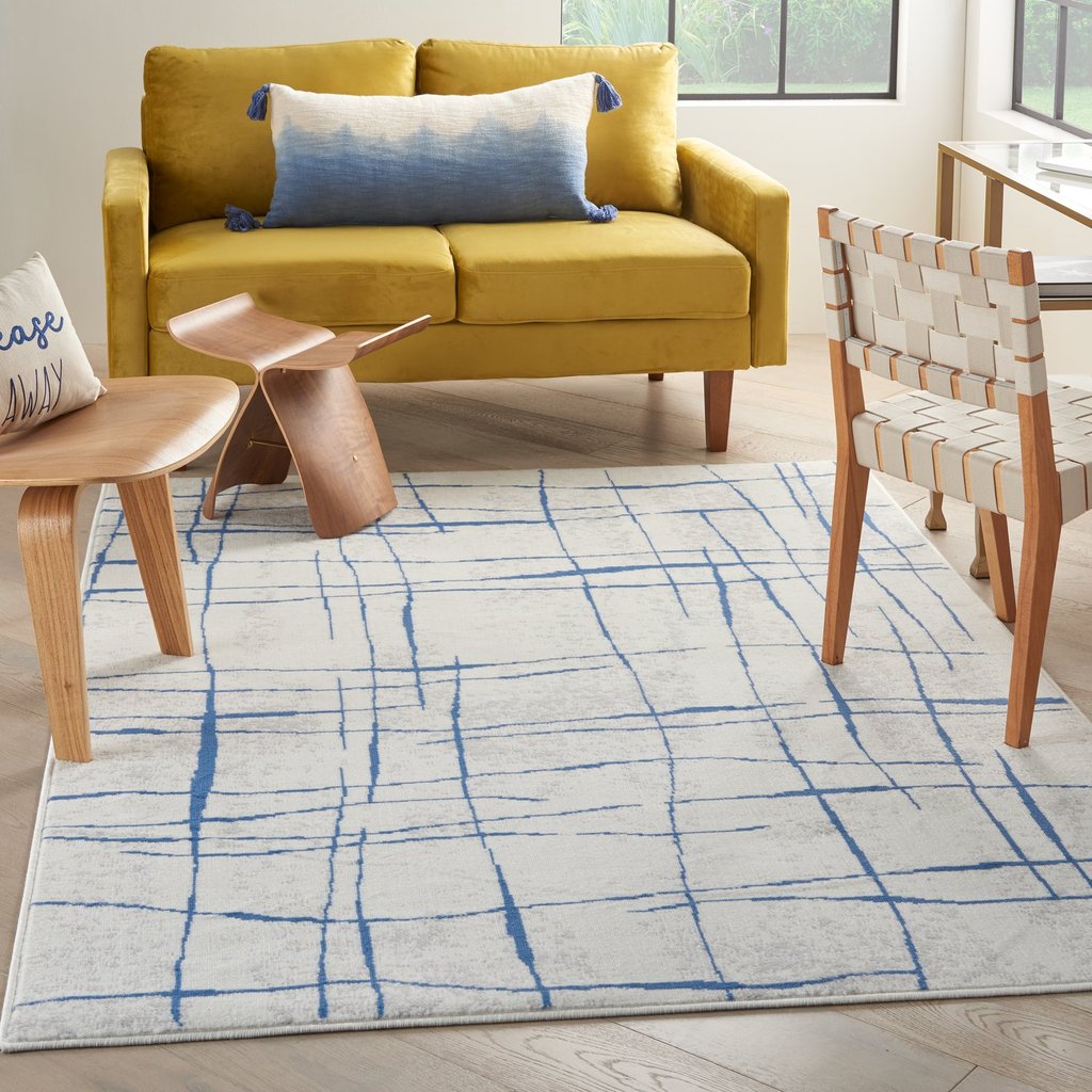 4' X 6' Blue And Ivory Abstract Dhurrie Area Rug