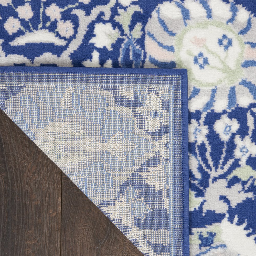 5' X 7' Ivory And Blue Floral Area Rug