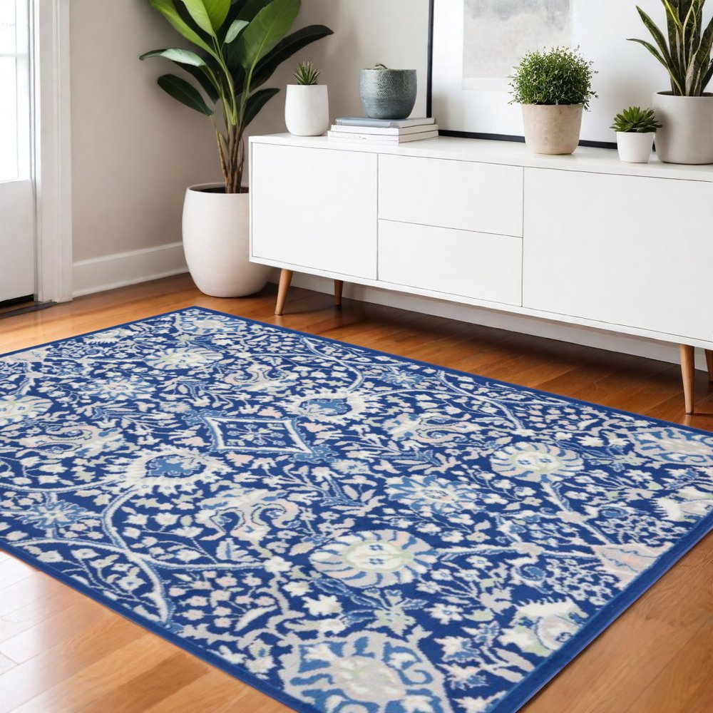 5' X 7' Ivory And Blue Floral Area Rug