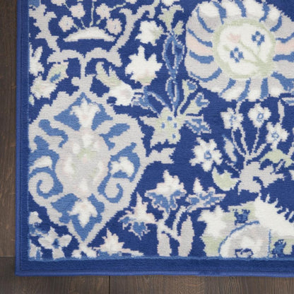 6' X 9' Blue And Ivory Floral Area Rug