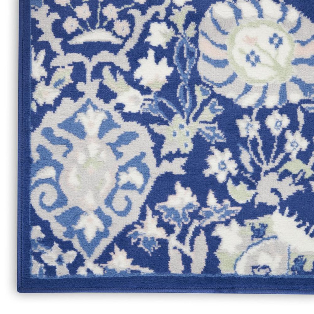 5' X 7' Ivory And Blue Floral Area Rug