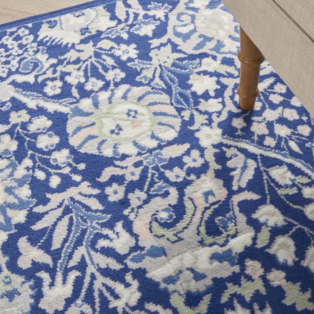 5' X 7' Ivory And Blue Floral Area Rug